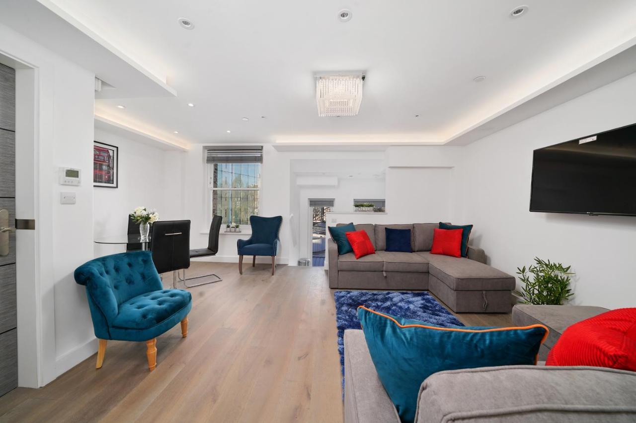 City Prime Apartments Londres Exterior foto A living room in a serviced apartment in London