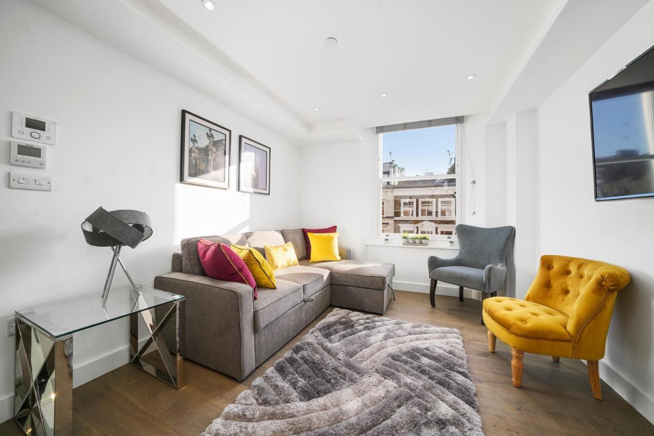 City Prime Apartments Londres Exterior foto A living room in a serviced apartment in London