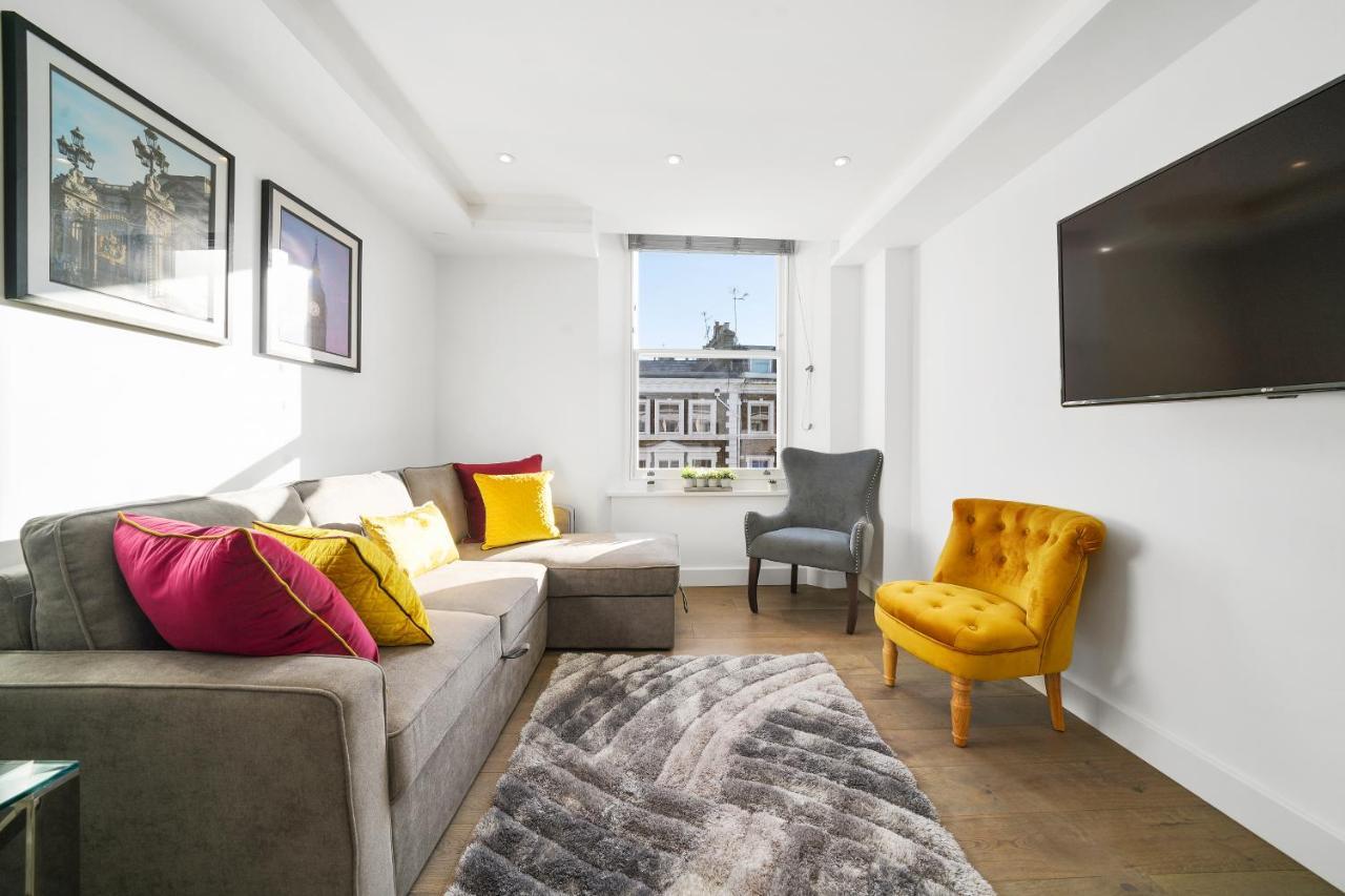 City Prime Apartments Londres Exterior foto A living room in a serviced apartment in London