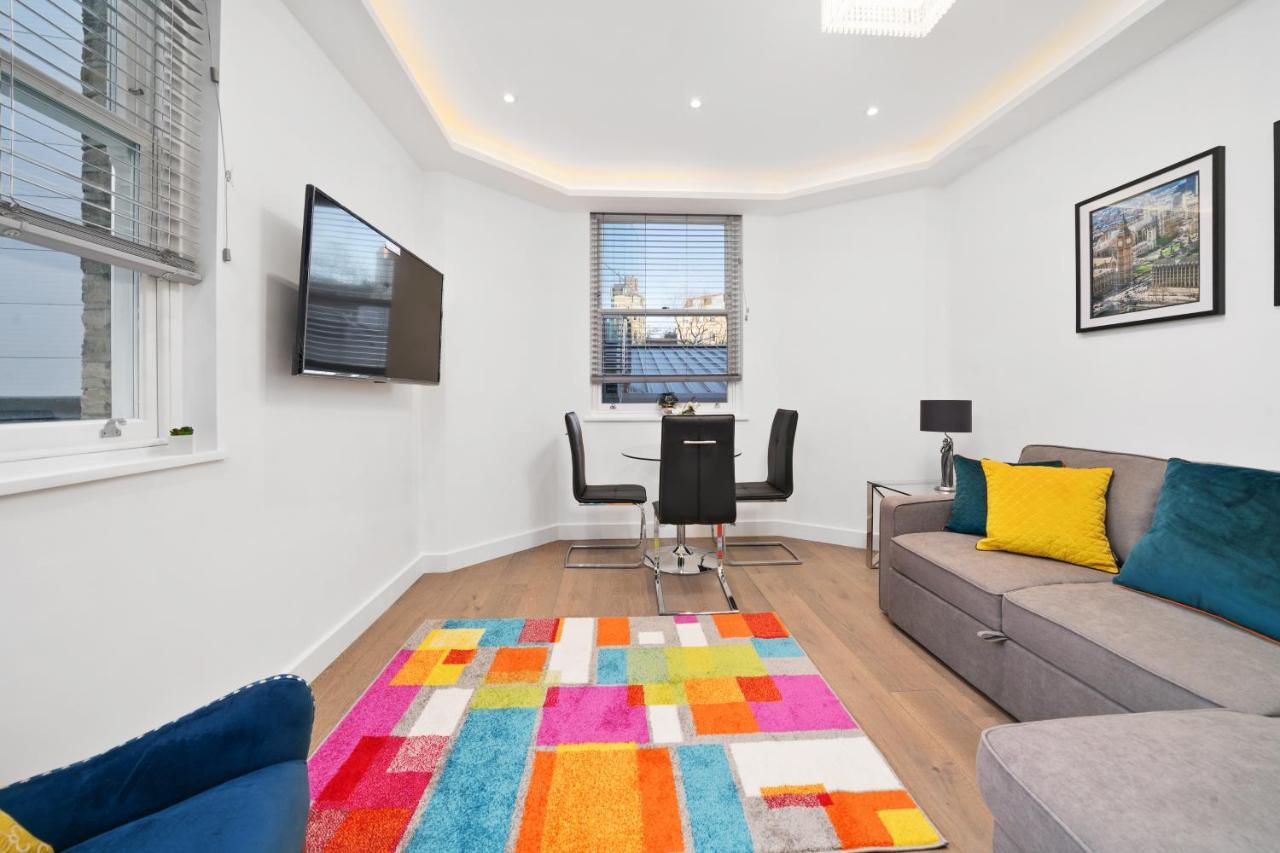 City Prime Apartments Londres Exterior foto A living room in a serviced apartment in London