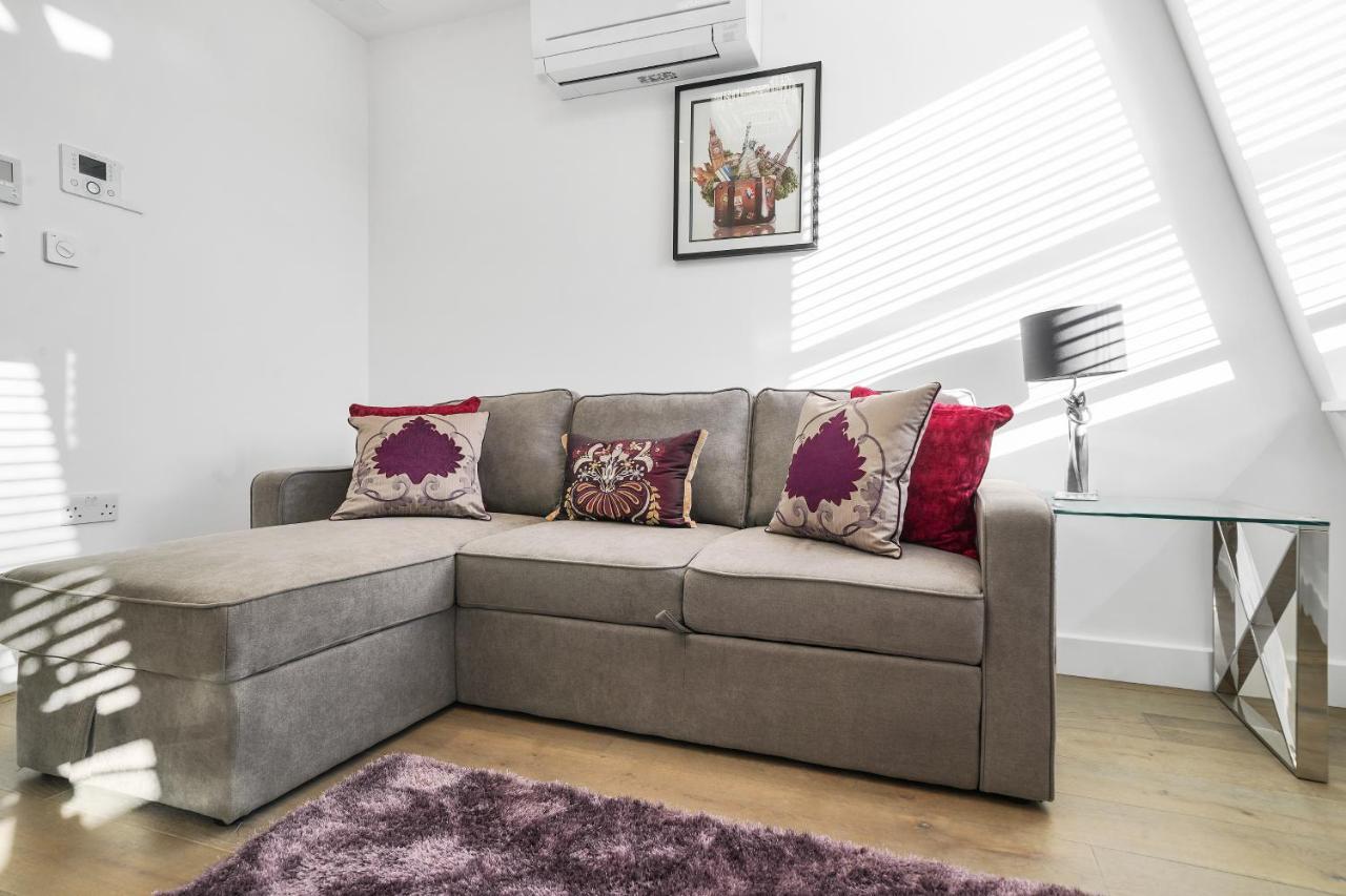 City Prime Apartments Londres Exterior foto A sofa bed