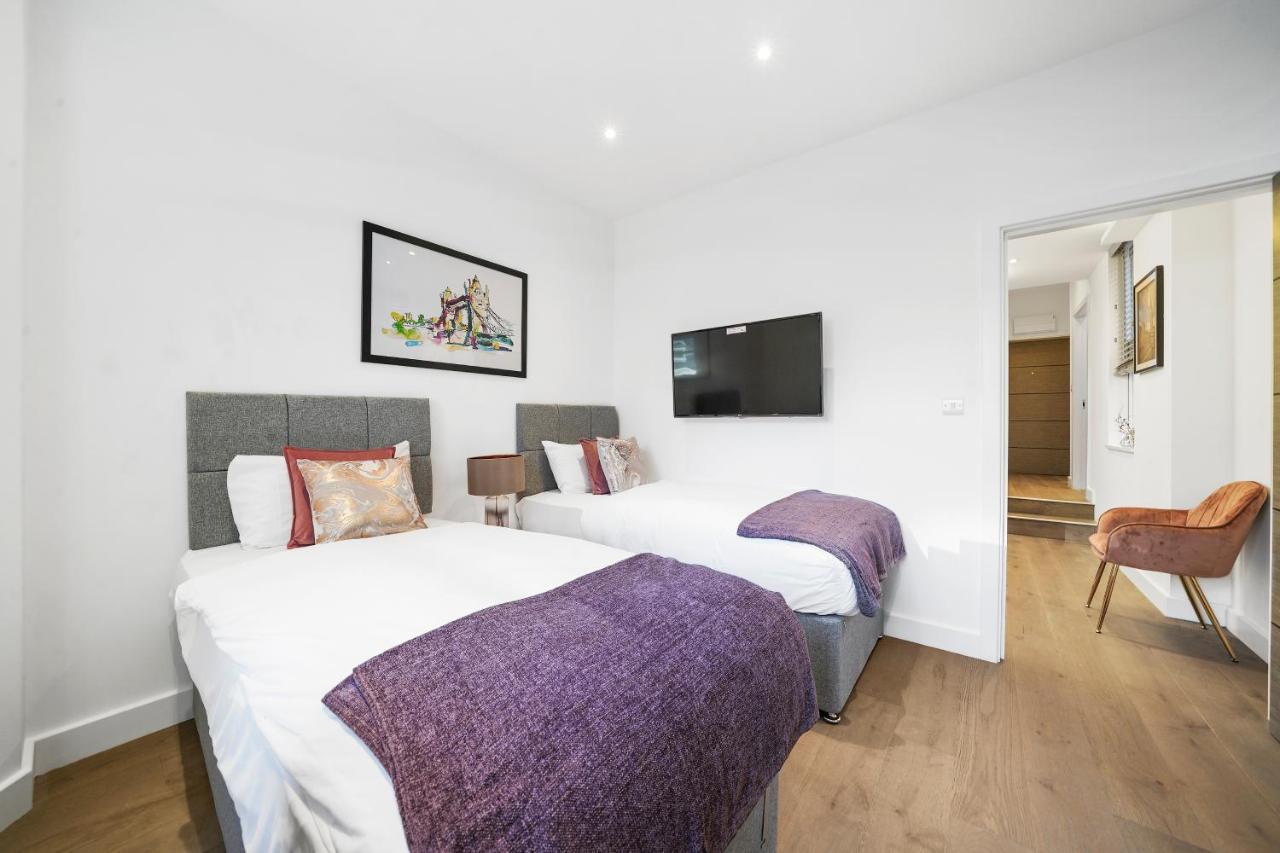 City Prime Apartments Londres Exterior foto A typical bedroom at the hotel